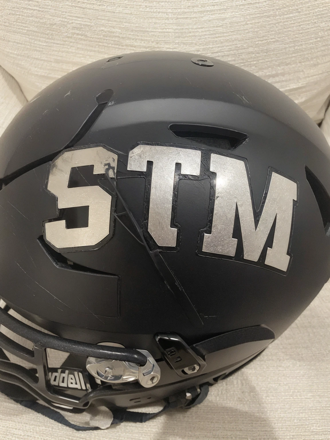 Remove the helmet and leave the logo