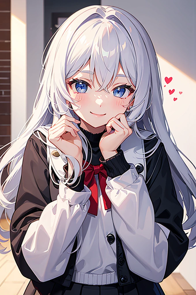 Cute girl makes a heart with her hands on her cheek and smiles.