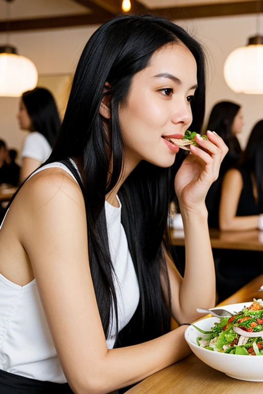 Woman white skin very long straight black hair , eating salad in restaurant 
