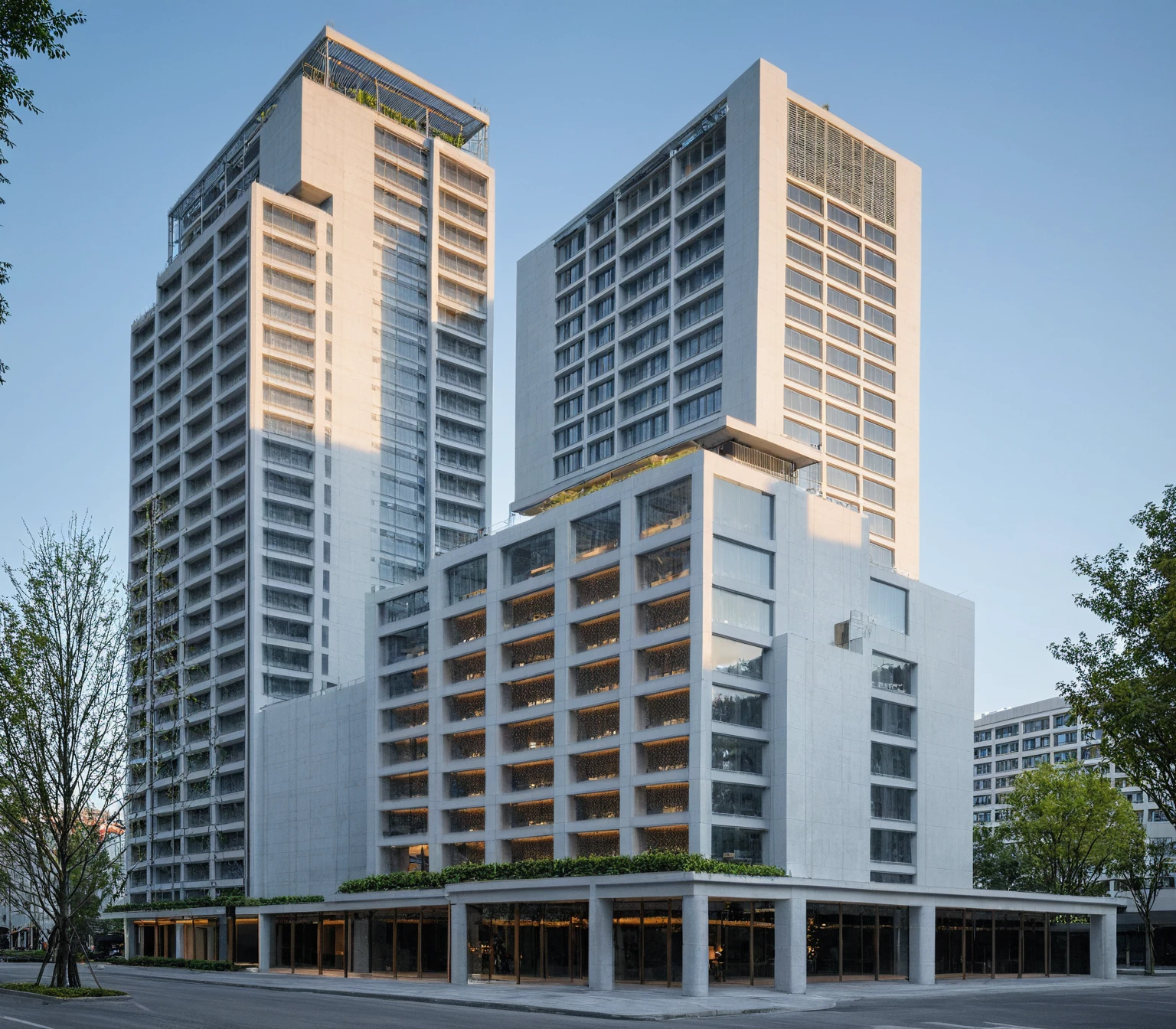 modern hotel in the style of Peter Zumthor, with full white glazing and grid detailing on an urban street corner, overlooking city streets. Architectural photography of an architectural masterpiece with a full building view, vivid color, natural lighting, 