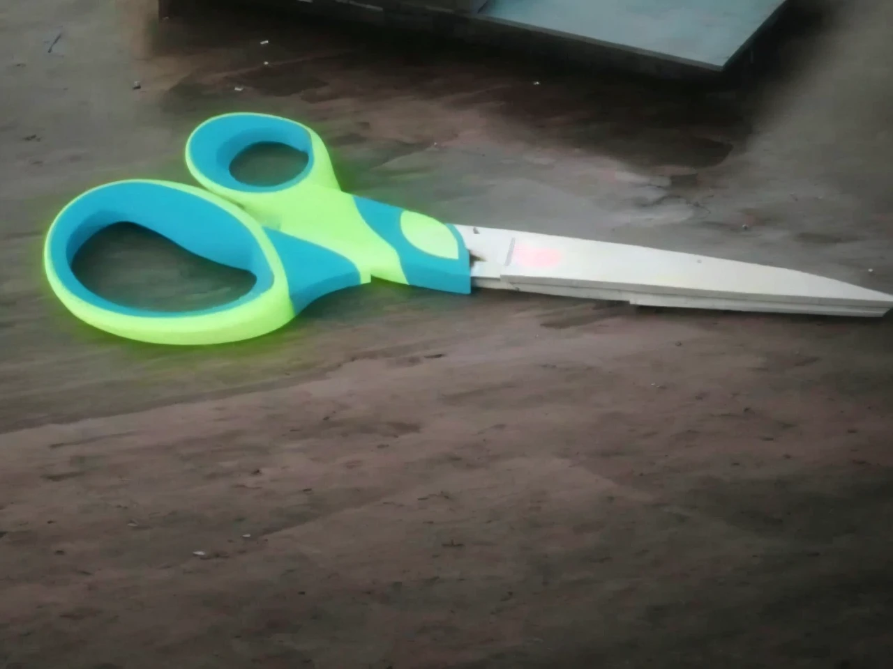 A cyberpunk building that looks like a scissor