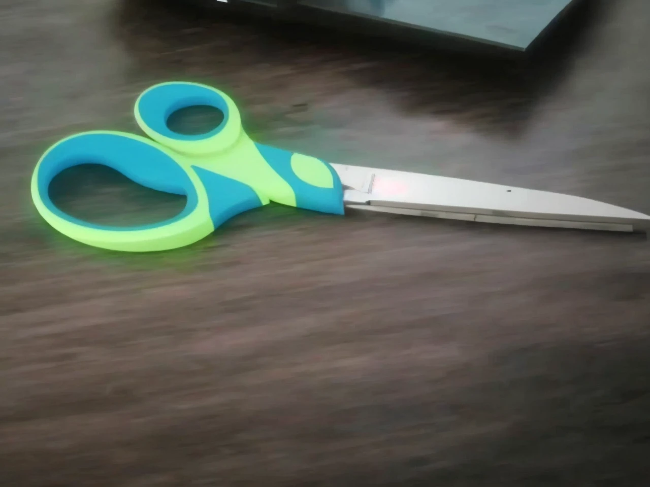 A cyberpunk building that looks like a scissor