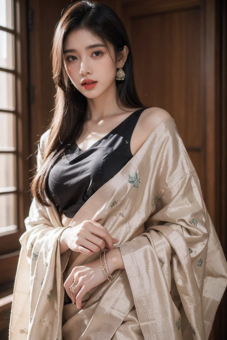 Mauve printed silk saree with beige and black Nakshi Kantha embroidery. Comes with matching unstitched blouse piece attached at the end of saree. Blouse shown in the photo is a styling suggestion, it is not a part of the actual product