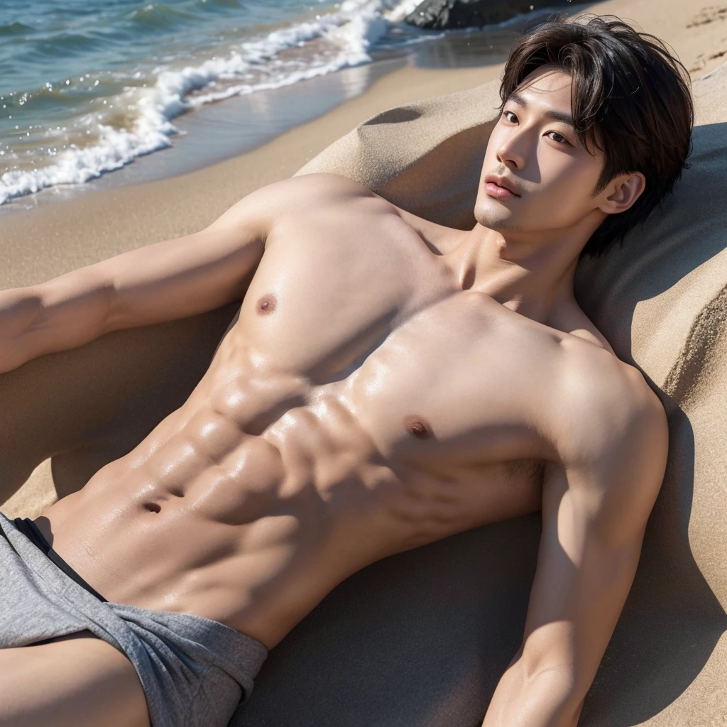 Handsome korean boy, shirtless in a beach