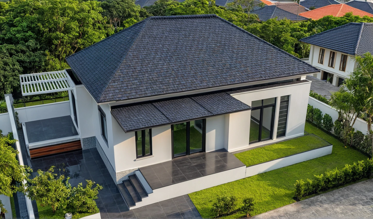 (masterpiece:1.2), best quality, photo of A two-story modern house in VietNam with white walls and dark tiles on the roof., tree and plant environment,daylight, streetcapes, natural light, vivid color, The exterior of an elegant single family home features large windows, a dark gray door frame.