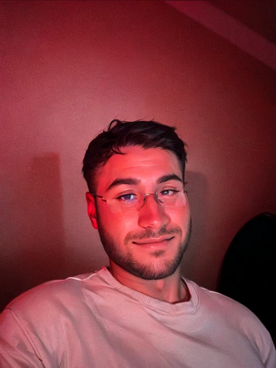 Let's have an animation-style actor with normal glasses on his eyes, headphones on his ears, as if he's playing a game, or a gun in his hand.
