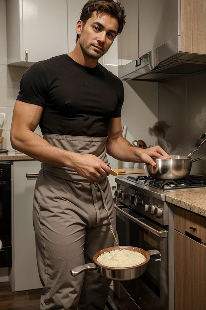 Handsome bulge man cooking at the kitchen