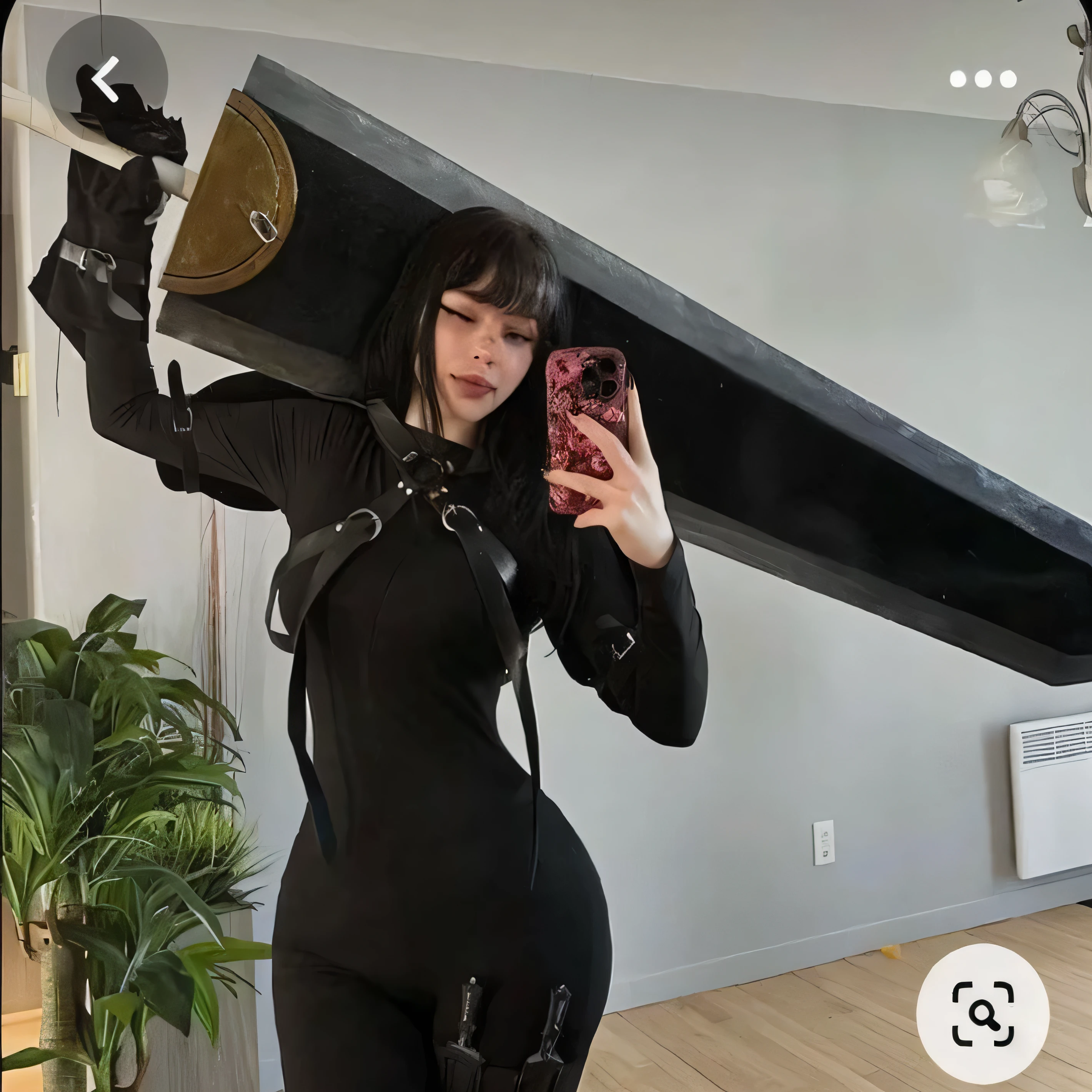 A girl with a big butt, she Has a huge sword, she smiling. She has black hair, your butt marked in dress.