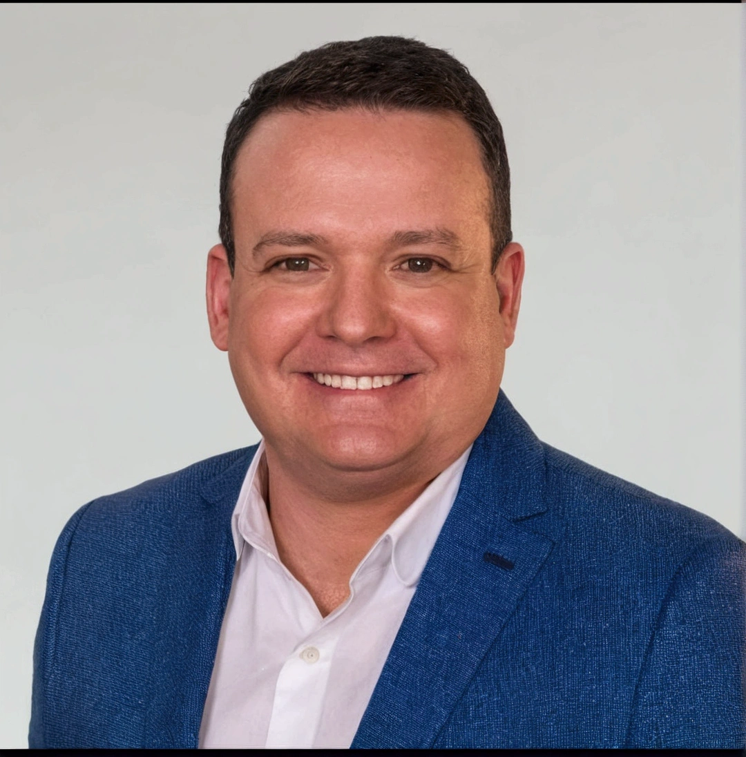 smiling man in blue suit