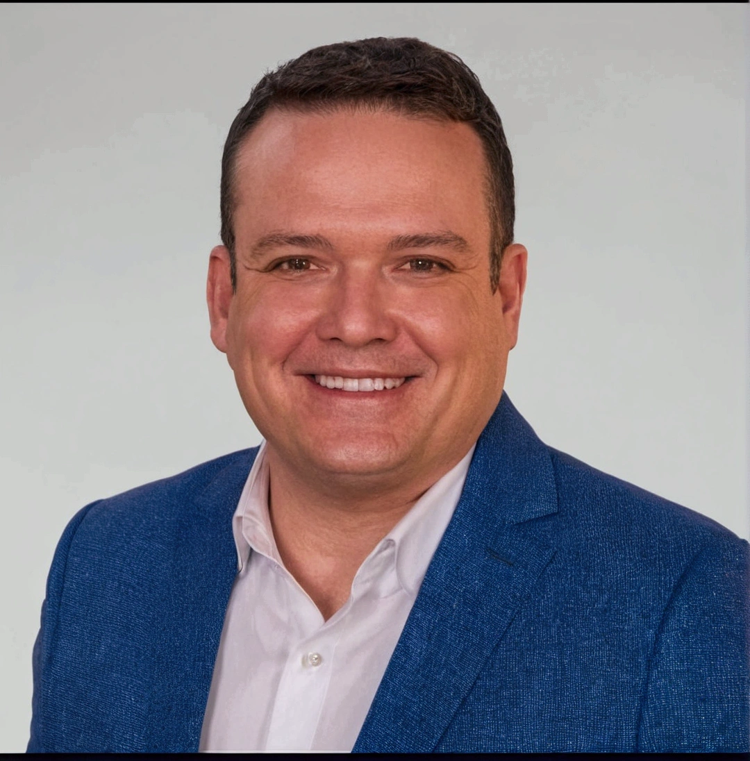 smiling man in blue suit