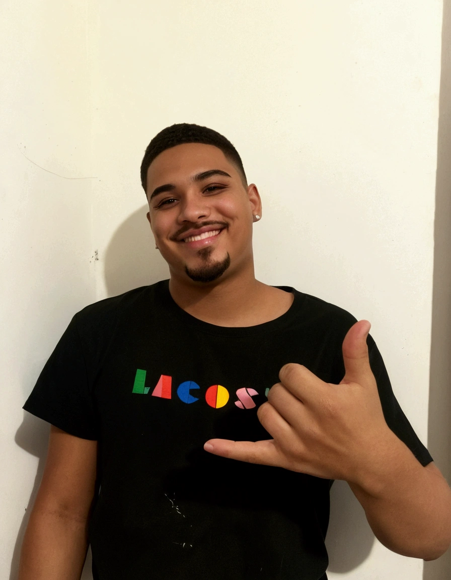 A boy with a beautiful smile, expensive eyes, short hair with a goatee, age 23 years old, straight eyebrows, is wearing a black shirt, a thin, marked face