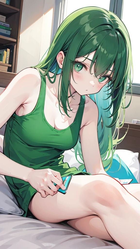 Flat woman, green tank top, laying in bed, looking at phone