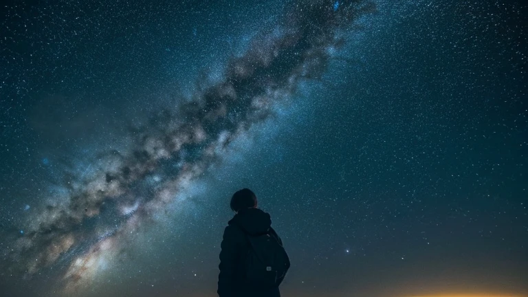 A friendly and bright atmosphere with a person greeting in front of a starry background. Text displaying &#39;Welcome to the world of constellations&#39;