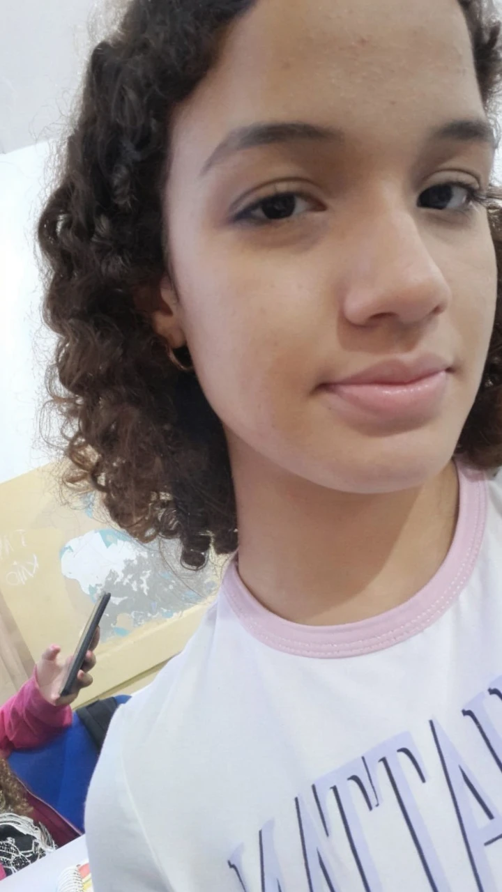 create one with black, wavy hair, that has a beautiful and angelic appearance, that is as white as snow and has light green eyes, that has a natural appearance and does not appear to be Asian