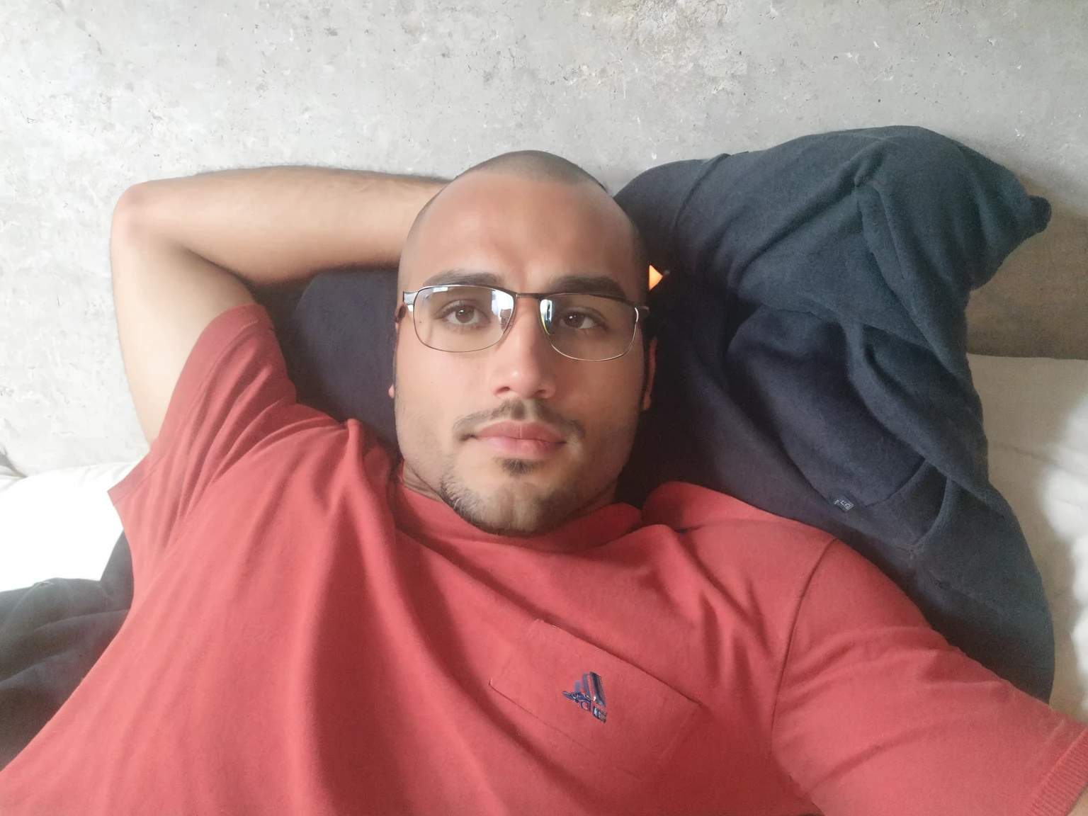 brunette man lying down