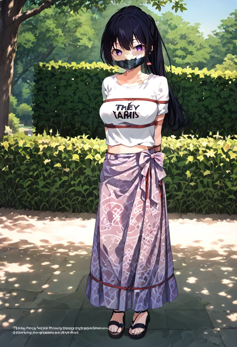 score_9, score_8_up, source_anime, 1girl, solo,The photo shows a young person standing outdoors,  They are smiling and wearing a white t-shirt with a design featuring a rabbit and text, paired with a patterned purple sarong or long skirt and sandals. The background appears to be a garden or a green outdoor area..(bound wirsts), (arms behind back), (tapegag, tape gag), dramatic,  (looking at viewer), (detailed pupils:1.3), ,red rope, thick rope,normal breast,full body ,long hair,black hair,ponytail hair, butterfly hair tie