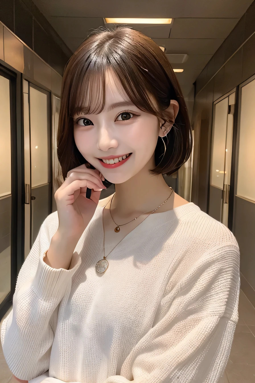 Highest quality, ,smile、Beautiful teeth alignment、short hair、Long sleeve blouse、ear piercing、necklace, , Face Focus、The background is a building corridor..