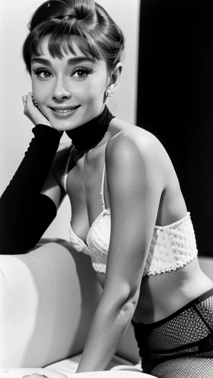 Audrey Hepburn dressed in sexy clothes and smiling