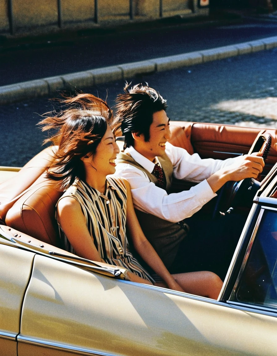 A candid snapshot of a French-Japanese couple in a vintage convertible,captured on film with genuine spontaneity. The wind tousles the woman's hair as they share a genuine laugh,and the colors rendered by the film create a warm,sun-soaked nostalgia for carefree moments.