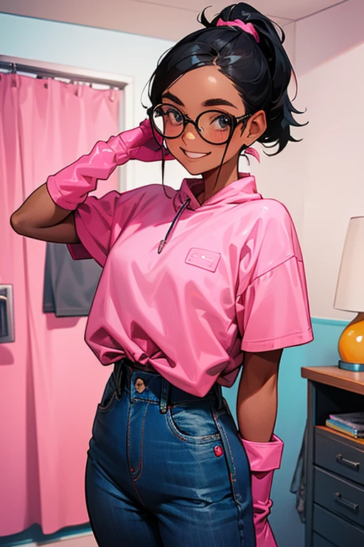 A freckled girl with glasses and black hair tied up, wearing a sweatshirt and jeans, wearing large pink rubber gloves and smiling gently in her room