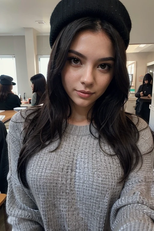 Sexy girl with long black hair taking a selfie, with a gray sweater and a black hat and with a black michila