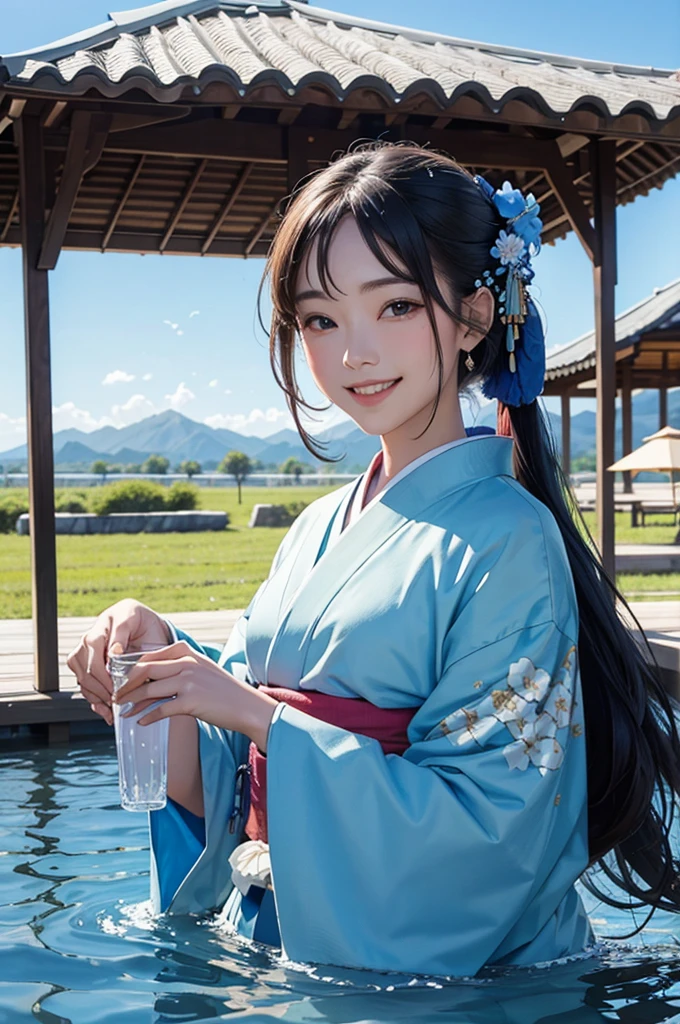 Smiling beautiful woman and kimono drinking water under the blue sky
