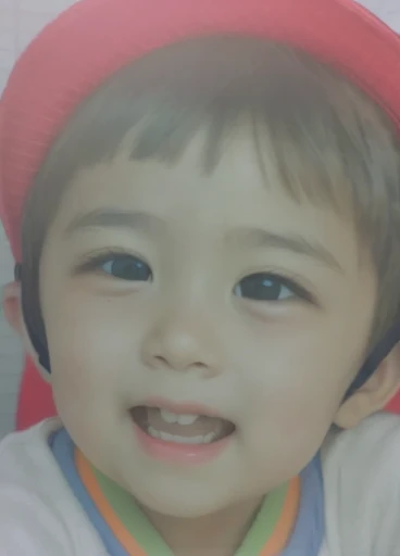 Realistic color photography style、Smiling emphasizes nasolabial folds. Make the chin a little thinner and accentuate the nasolabial folds.、I want it to look more like a color photograph...........。3 year old boy, Xu々To、Clearly visible、Emphasizes deep nasolabial folds from nose to mouth、Generate left and right dimples、Show me your beautiful smile.。Make your eyes look cute with double eyelids.More more more more、Generate a color photo