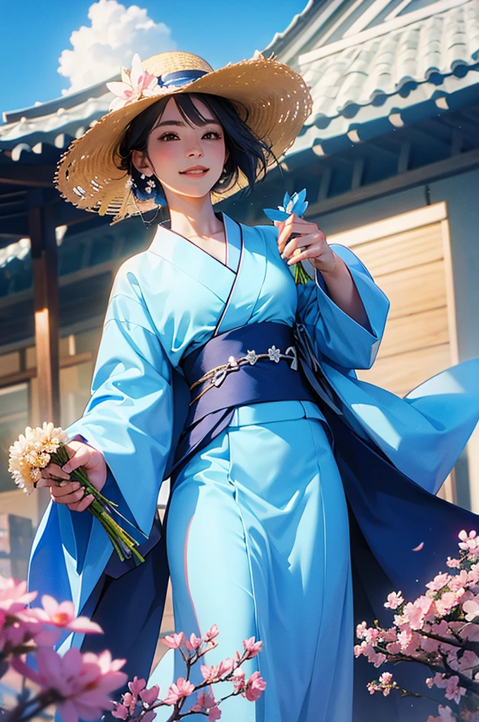 Under a clear blue sky, a beautiful woman wearing a blue kimono smiles while holding a bouquet of flowers.