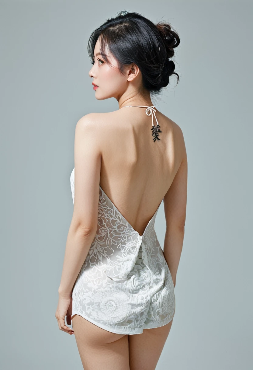 Woman with a tattoo on her back、Back view