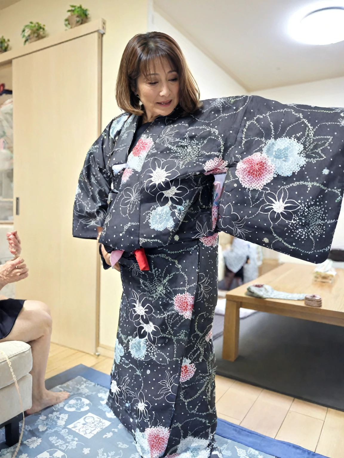 A woman in her 50s trying on a yukata