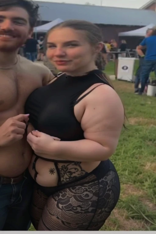 there are two people standing together in a field with a glass of wine, she is wearing a black tank top, mid 2 0's female, very very low quality picture, profile picture, a person at a music festival, her hand is on her waist, wearing a cropped black tank top, wearing a black cropped tank top, she has a jiggly fat round belly, beautiful girl, big , huge assbw, f behind, thick, thick thighs, wide hips, bbw, big ideboob, giant ass, side vi big butt, round butight underweunderwear halfway off, underwear taking off, grabbing ass, ass spilling over erweatoo thick for clothes, facing right, dominatrix, dominatrix clothe