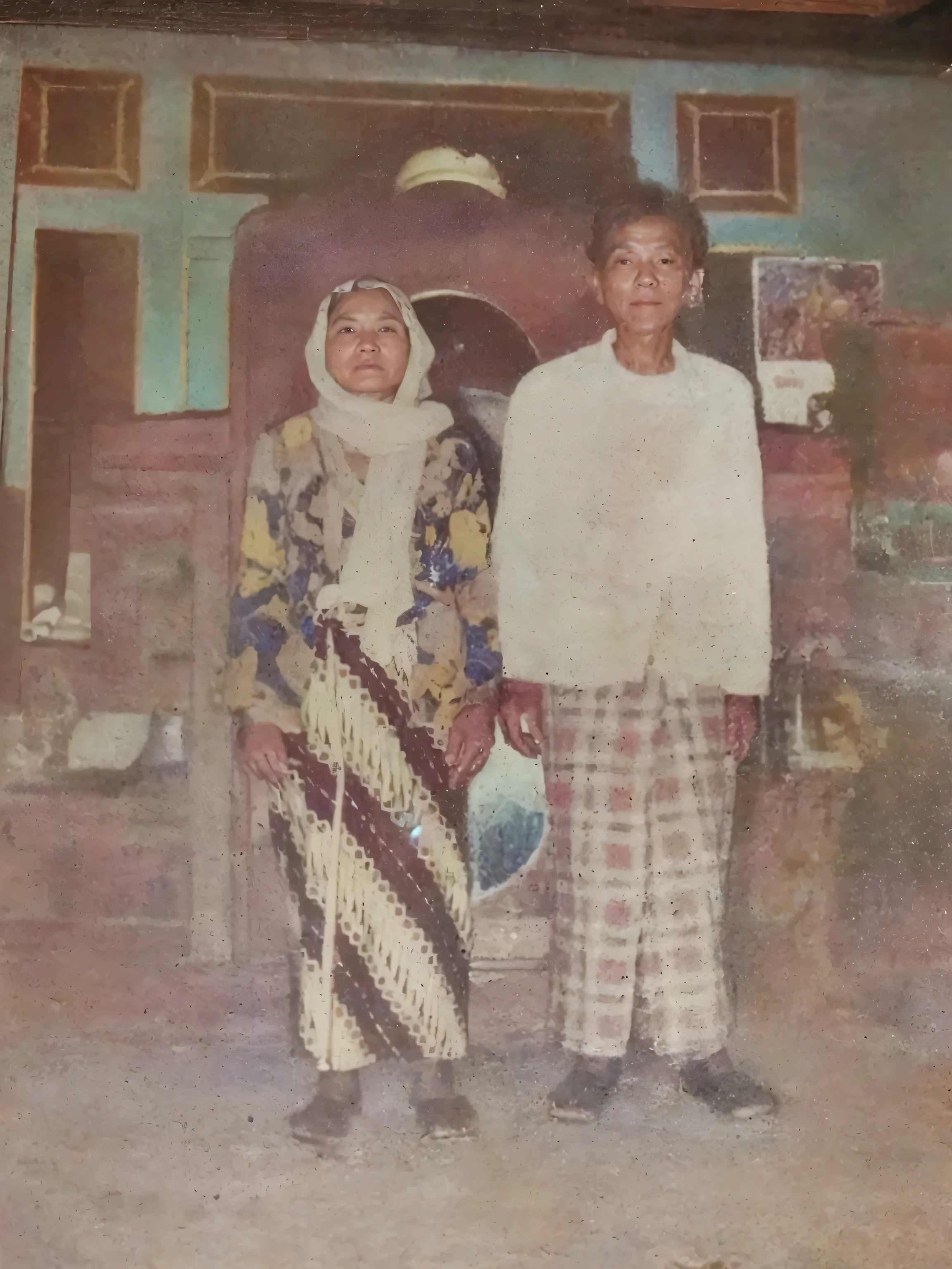 Make this photo look realistic and detailed, there are two people standing in front of a building, old picture, old photo, old damagaed polaroid photo, an indonesian family portrait, aged photo, very old photo, potrait, lost photo, momma and papa, protrait, historical image, photo taken in 2 0 2 0, old color photograph, old photograph, old style photo, couple, very detailed potrait, realistic portrait photo, close up potrait, profile portrait, very detailed face, very realistic face, very perfected face, very detailed clothes, very realistic clothes, very perfected clothes