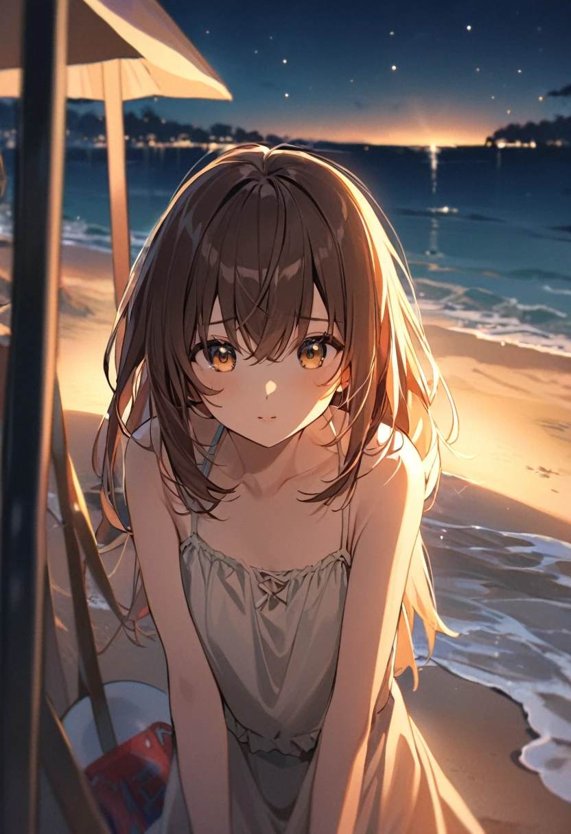 A girl with brown hair and hazel eyes.She wears a . Playing at the beach at night 