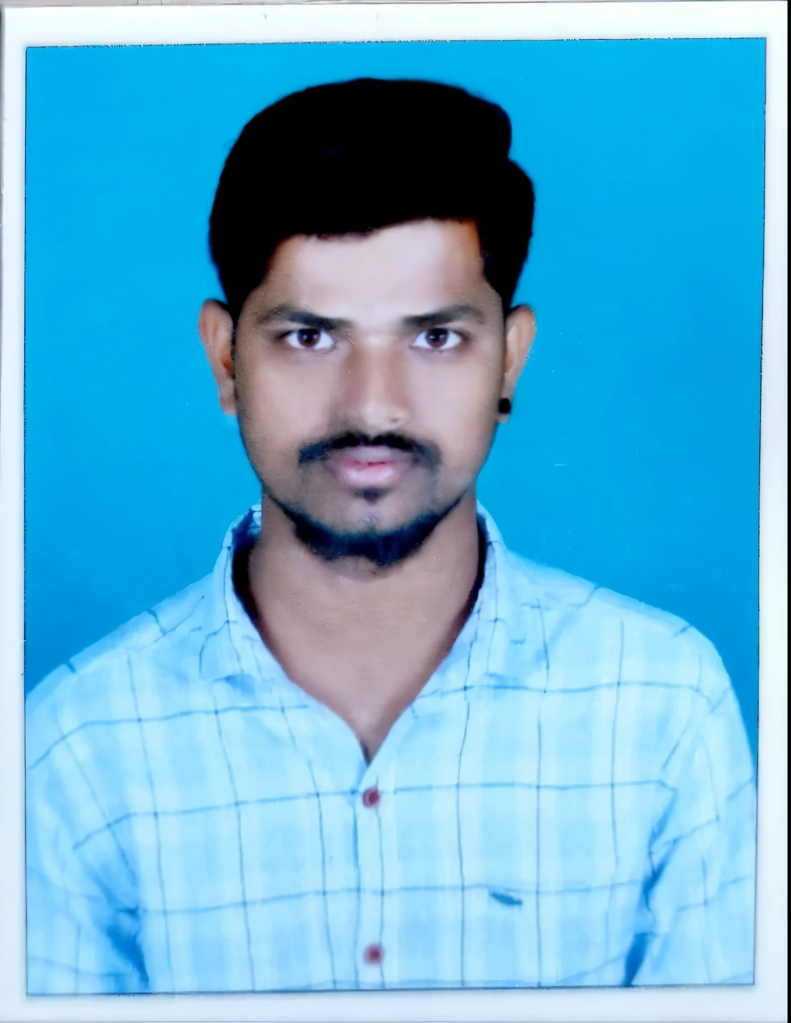 India Yong boy with stylish dress and hair cut