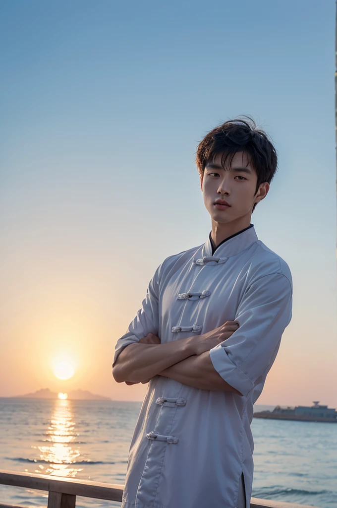Chinese male at the seaside with the rising sun shining overhead