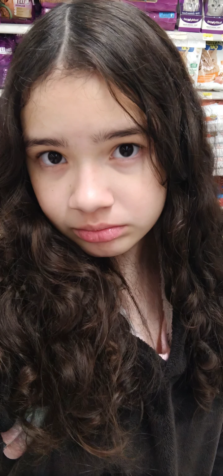 Girl in black clothes, in a supermarket
