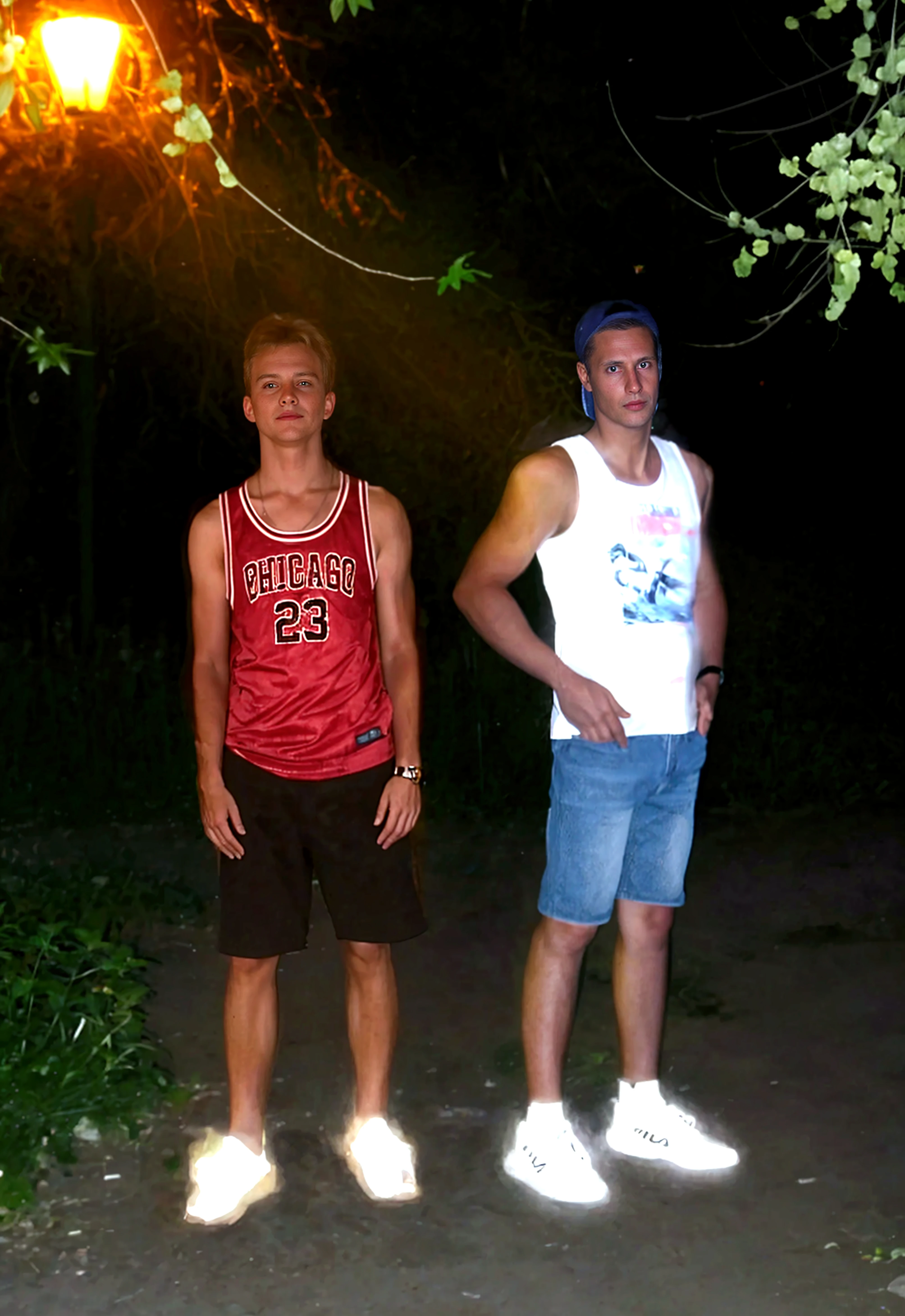 Two sweating muscular European teenage boy scouts in a tent in the forest