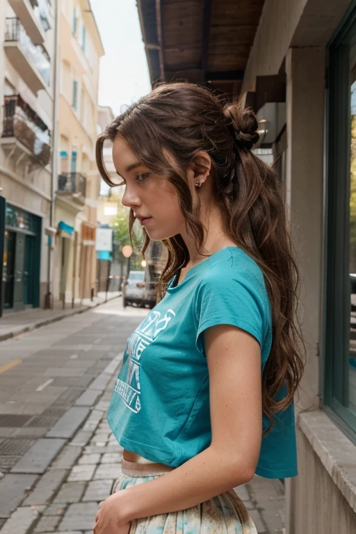 A girl with wavy brown hair and blue eyes, with a turquoise t-shirt and a long skirt, she wears her hair up