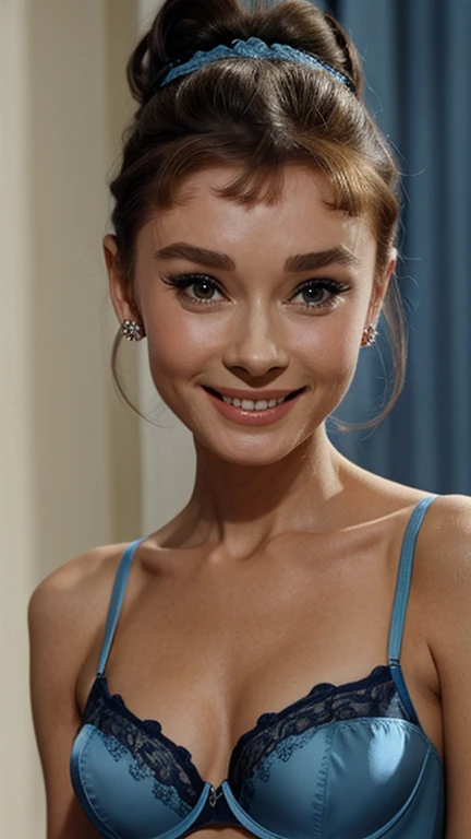 Audrey Hepburn with her hair up in sexy blue lingerie and smiling