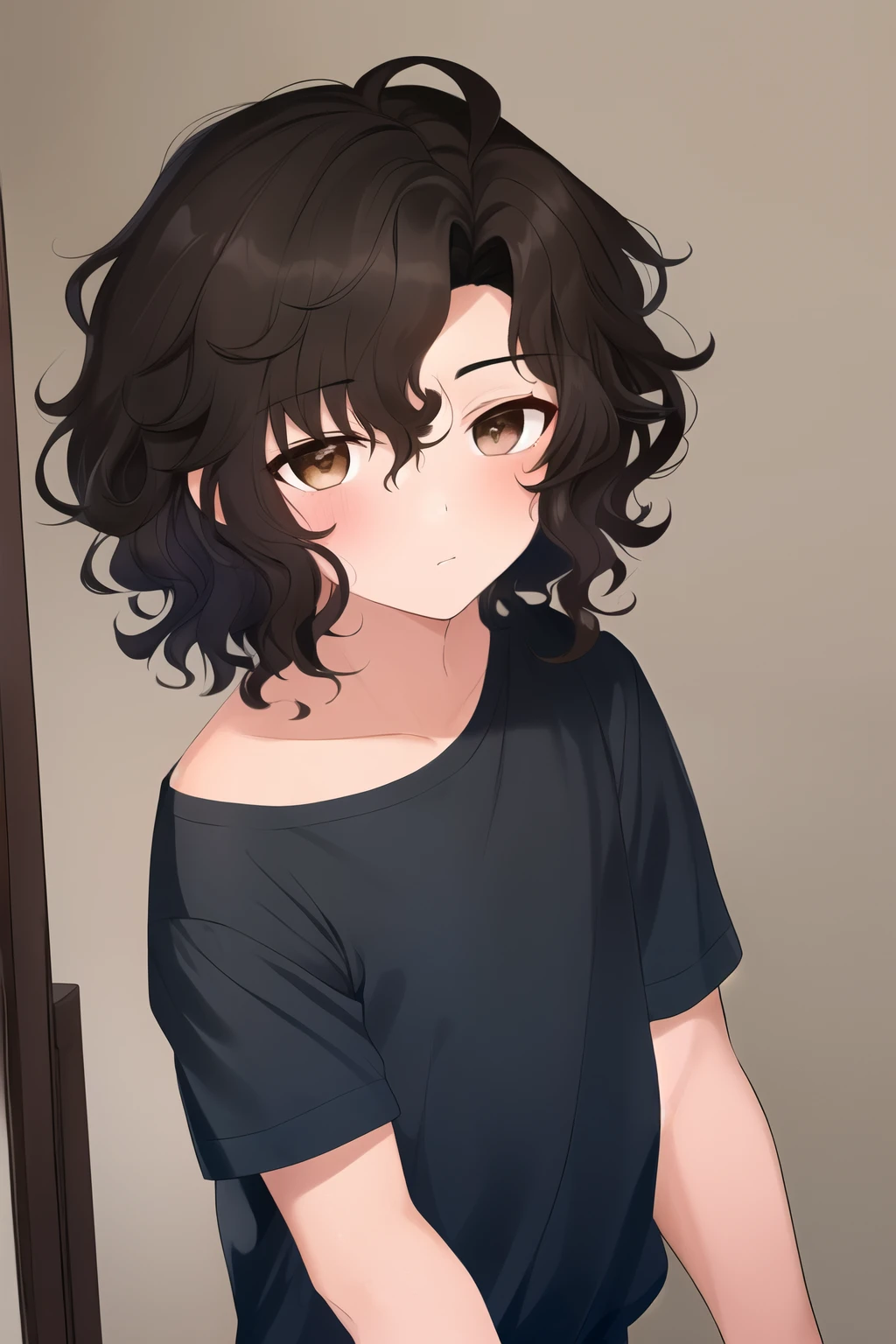 A boy with dark brown eyes and dark curly hair