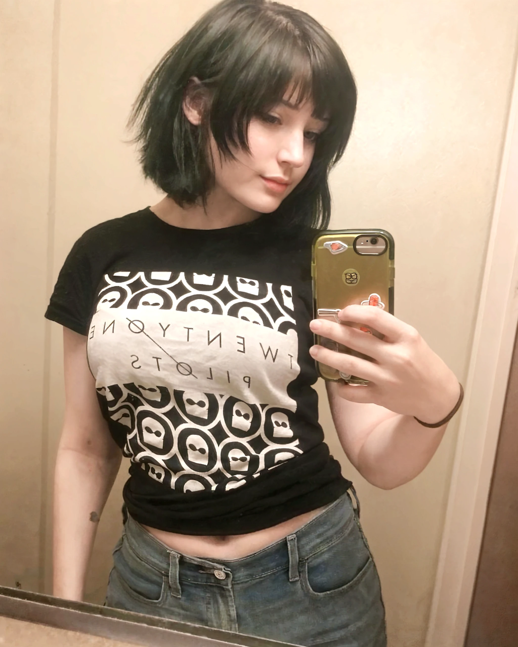 1 Cute 15 year old girl, short black hair, brown eyes, cute face, pale skin, red plaid shirt, white shirt with skull print underneath, black shorts, black tights, black fingerless gloves, 16 megapixels, good quality, bedroom, selfie in front of the mirror