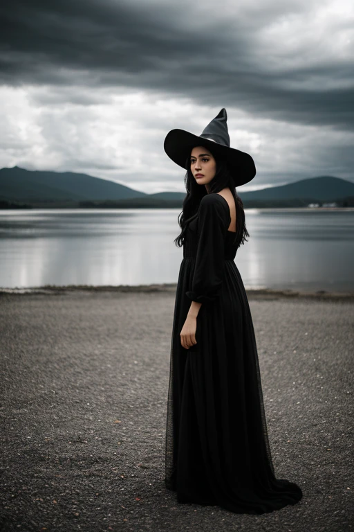 Black long hair, black long dress, Witch hat on her head, overcast sky, the girl stands tall, floor-length dress, high detail fingers, high detail face, everything is in shades of gray, the sun illuminates the face through the clouds