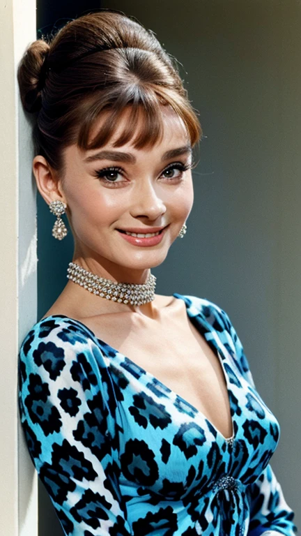 Audrey Hepburn dressed in blue leopard clothes and smiling