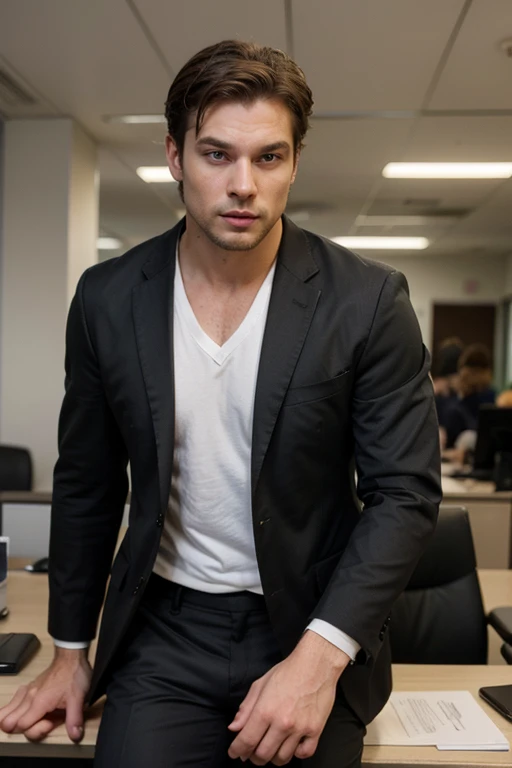 Strong man in a suit with green eyes in an office 