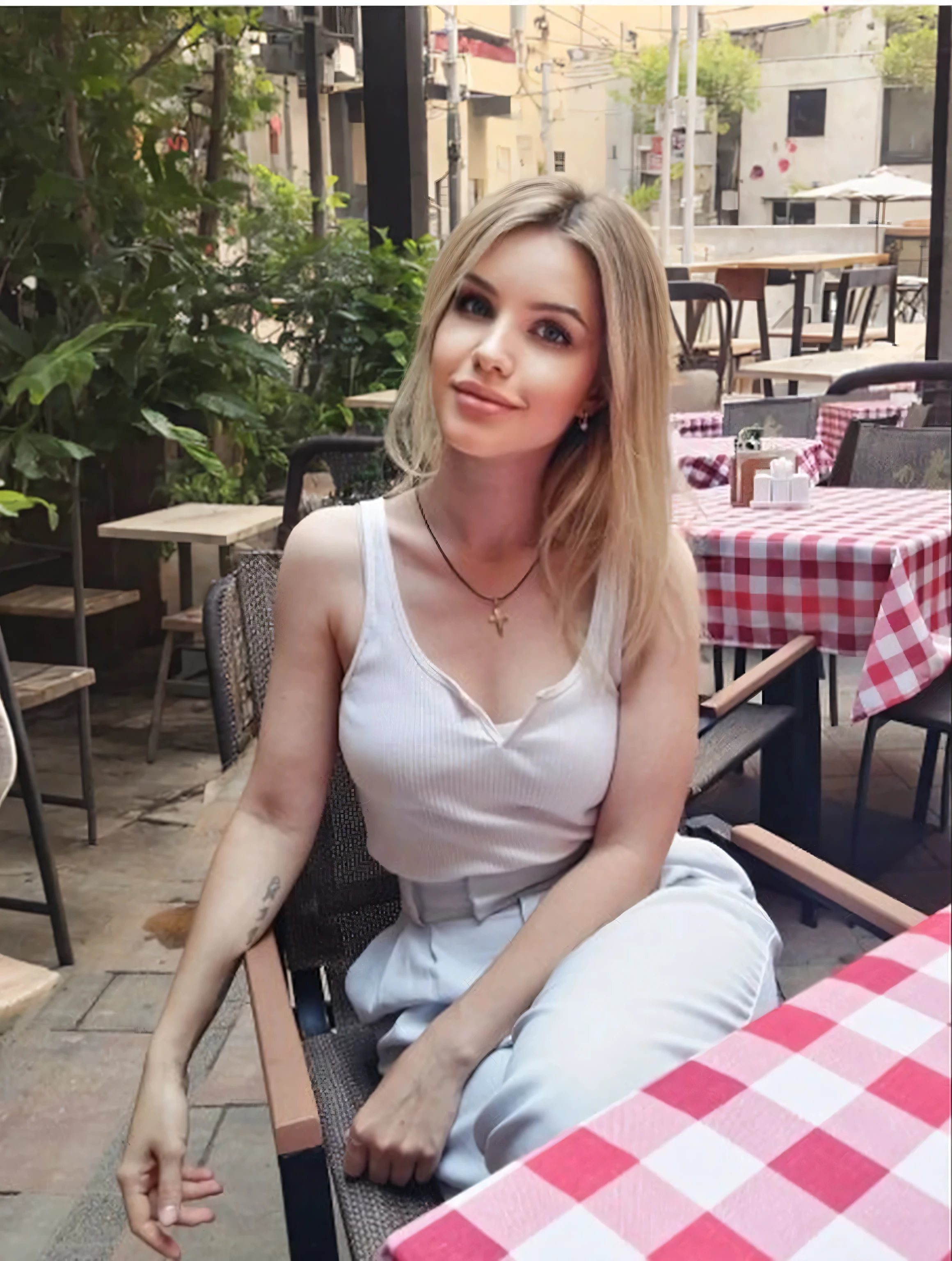 Beautiful girl in outdoor restaurant