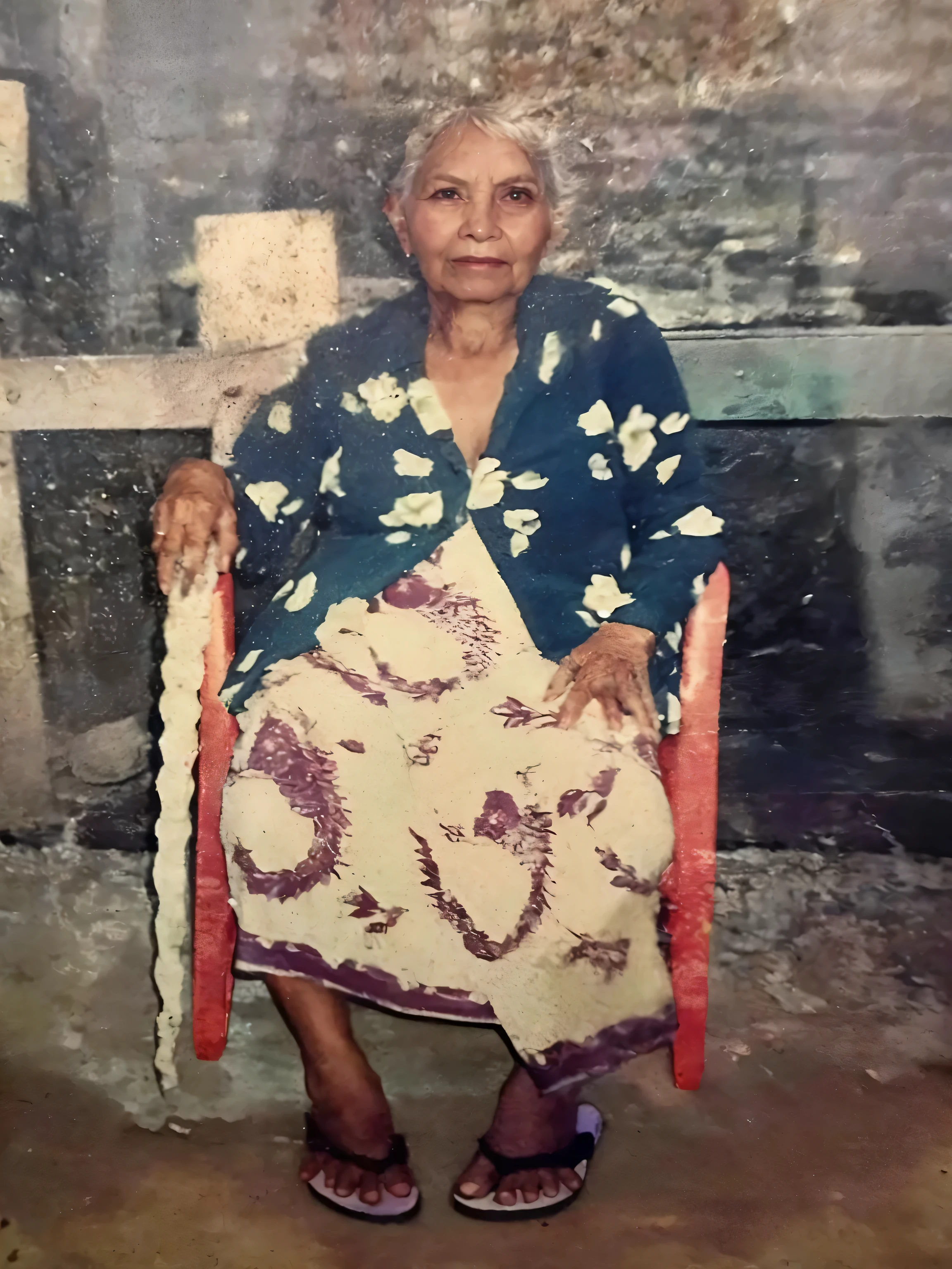 Make this photo realistic and detailed, there is a woman sitting in a chair with a red chair, 8 0 years old woman, an old lady with red skin, old damagaed polaroid photo, an old lady, photo taken in 2 0 2 0, old picture, potrait, photo of a woman, she is about 8 0 years old, old lady, old woman, old photo