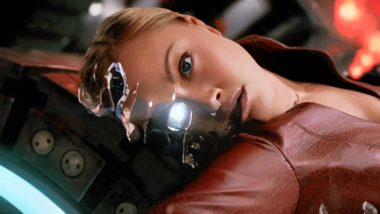 woman, sexy slut, Kristanna Loken, red jacket, her body was now being sucked into the tube, Liquid metal starts to pour into the side of the tube. her body was spewing a bunch of liquid metal all over the place, extremely sexist