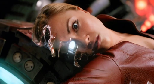 Kristanna Loken in red leather jacket, his body was now melted by the tube, Liquid metal begins to pour into the side of the tube.  His body was spewing a lot of liquid metal all over the place.,extremely sexist. 