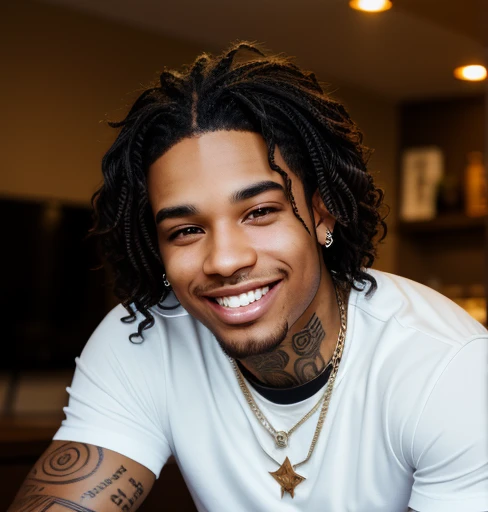 Lightskin male with brown eyes and Jorden necklace with tattoos and shirt black wavy hair grills smiling piercings