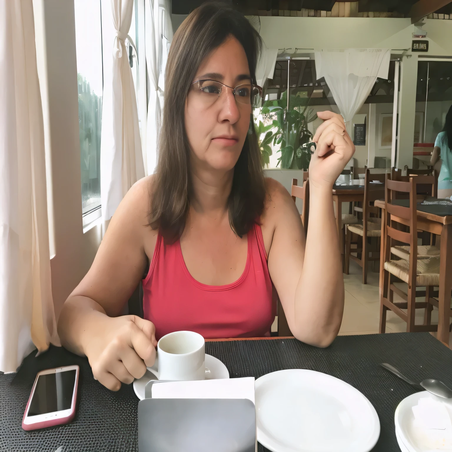 woman sitting at a table with a cup of coffee and cell phone, sitting in a cafe, 45-year-old woman from cuba, drinking coffee, woman drinking coffee, drinking a coffee, sitting at table, breakfast at las pozas, sitting in a cafe alone, in a coffee shop, sitting on a mocha-colored table, 35 year brazilian mother
